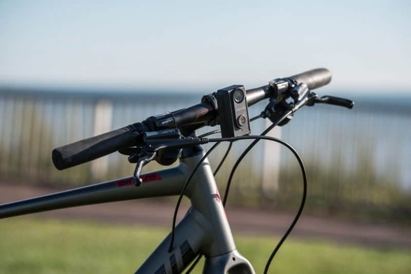 Bicycle camera CF-1 FRONT LIGHT attached to bike handle