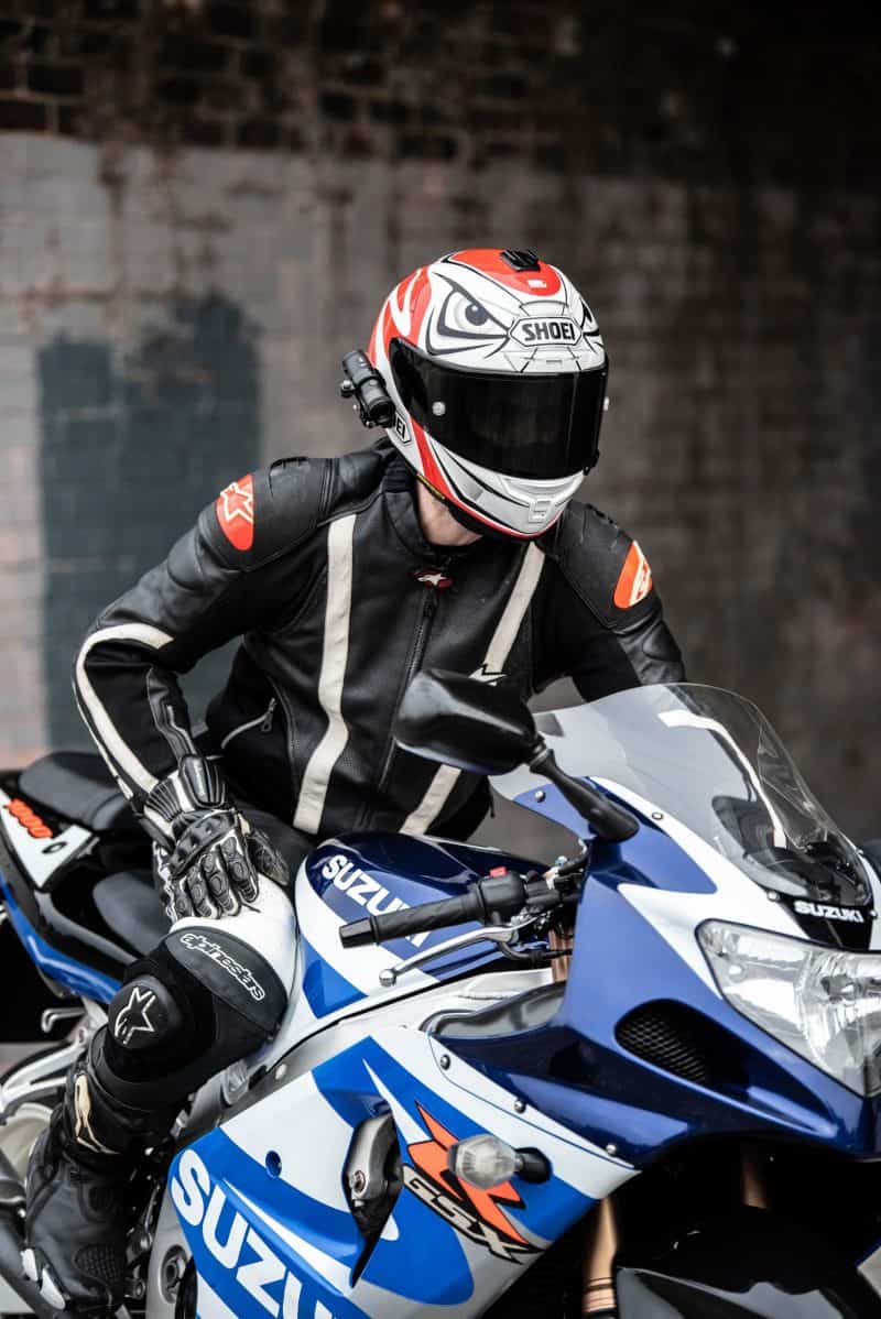 Man sitting on motorbike XV-1 2K QHD Helmet Camera