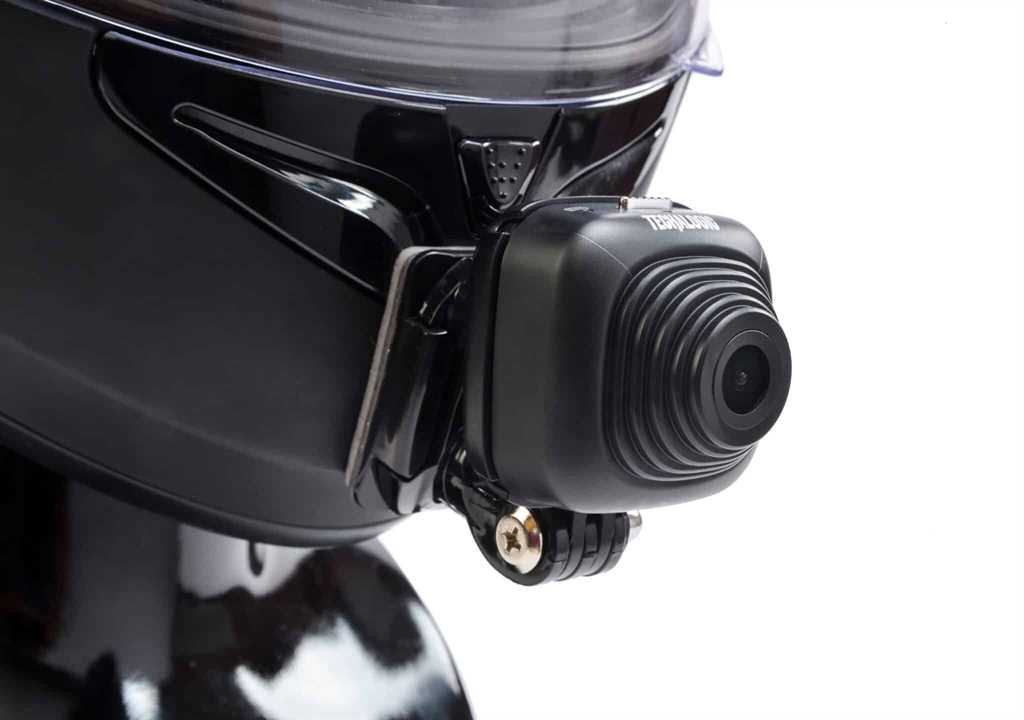 HC-1 mounted on the side of a red motorcycle helmet