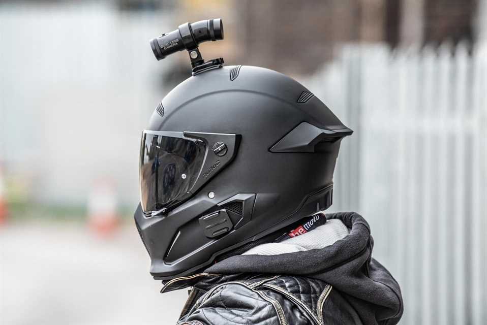 Dual-lens camera mounted on a motorcycle helmet